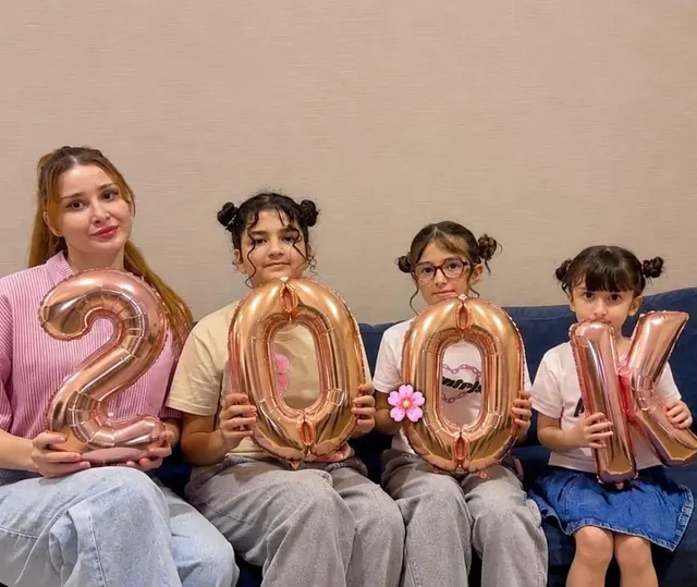 Farnaz and her daughters celebrating 200K followers